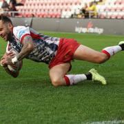 Gareth O'Brien drops over for a try for Leigh Leopards