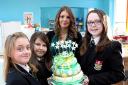Pupils Jennifer Cox, Gemma Watkins, Casey Ward and form teacher Nicola Hurst with their Trussell Trust  themed cake