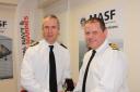 Lt Cdr Chris Roberts receiving his Clasp to the LS&GC medal from Rear Admiral Keith Blount OBE, head of the Royal Navy’s Fleet Air Arm.
