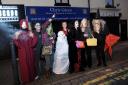 Members of Manchester People’s Assembly holding a Halloween-inspired protest outside Atherton MP Chris Green’s office