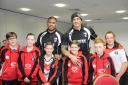 Sonny Bill Williams (back right) with youngsters from Thatto Heath ARLFC