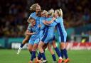 England players mob Ella Toone after her magnificent goal