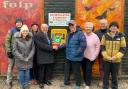 Friends of Lilford Park with the installed defibrillator
