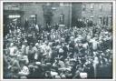 Crowds line King Street in Leigh town centre in 1915 as captured German prisoners of war are escorted towards the canal bridge heading for a camp at Lilford Weaving shed