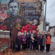 Graffiti artists paint Remembrance Day mural in memory of Leigh veteran