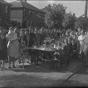 A party celebrating Victory in Europe Day on Hurst Street                                                                               Picture: Wigan and Leigh Archives and Local Studies