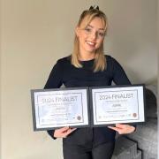 Shannon with two of Aspire's award nominations