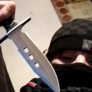 Police released an image of Rance posing with a blade