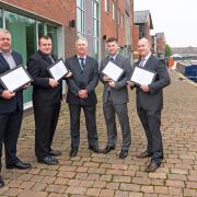 Pictured with the charter are, from left, Ian Lucas from Truline, Neil Holding from NPS, Councillor David Molyneux, Chris Connolly from A Connolly, and Chris Parr from CPEC.