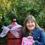 Beth Wilcock who has had 2 open heart surgeries celebrated her 18th birthday and asked for donations to Alder Hey charity instead of receiving presents, pictured at her Astley home with the Post Box she asked for donations to be posted in

 (23847544)