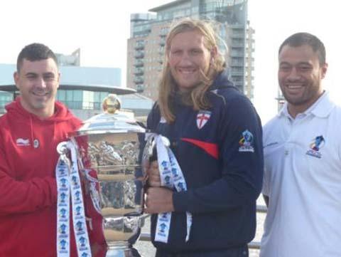 Warrington and Wales winger Rhys Williams with England's Eorl Crabtree and Samoa's Tony Puletua celebrating one year till the World Cup