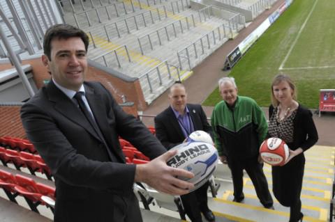 At the Leigh Olympics launch in February were, from left, Andy Burnham MP, Simon Town, chief executive of Leigh Sports Village, Mike Hack, from Astley and Tyldesley Cycle Speedway Club, and Hayley Smith, editor of the Journal