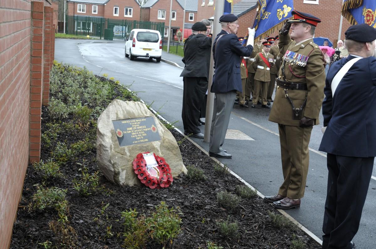 Major George Briscoe laid a wreath of poppies at the foot of the stone