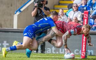Josh Charnley touches down