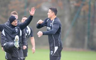 Shaun Johnson, left, and Sonny Bill Williams, warm-up for training at Leigh Sports Village. Pictures by Mike Boden