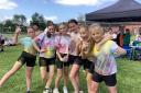 Pupils at Bedford Hall primary enjoying the colourful fun run