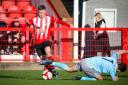 Witton Albion go past Prescot Cables in Saturday’s clash at the U Lock It Stadium. More details and pictures on page 55. Picture: Karl Brooks Photography