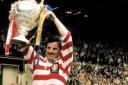 Alex Murphy lifts the cup after Leigh's 1971 Wembley triumph
