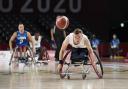 Leigh's Gregg Warburton pursues the ball for the ParalympicsGB wheelchair basketball team against reigning champions USA in Tokyo. Picture: imagecomms