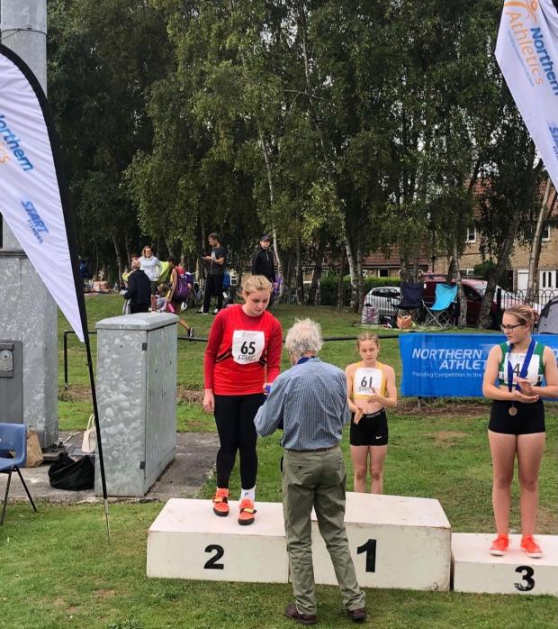 Leigh Journal: Bethany winning silver in the Northern Athletics Championships Under 13's shot put
