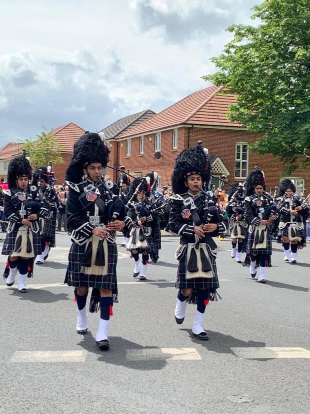 Leigh Journal: Brass and bagpipe bands entertained crowds on the way to Meadowbank fields (Pic: Keely Ashton)