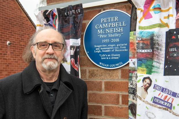 Leigh Journal: Malcolm Garrett outside the Pete Shelley memorial plaque in Pennington