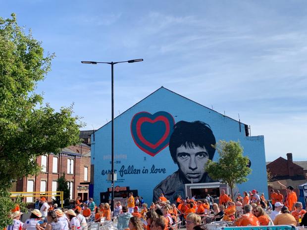 Leigh Journal: Fans in the shadow of the Pete Shelley mural