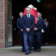 The coffin of Roger Hunt is led out of Liverpool Cathedral after his funeral. Picture by Mike Egerton/PA Wire