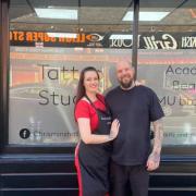 Lauren King and Chris Minshall outside Religion Tattoo and Make-Up Studio