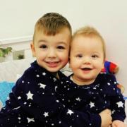 Brave four-year-old Jaxon Garvey with his younger brother Finley