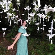 Louise Fazackerley with the 1,000 flying origami birds