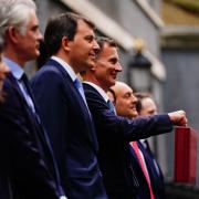 Chancellor of the Exchequer Jeremy Hunt holds up his ministerial box as he stands outside 11 Downing Street, London, with members of his ministerial team, before delivering his Budget at the Houses of Parliament. Picture date: Wednesday March 15, 2023.