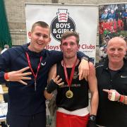 National champions Paddy and Will Hewitt with coach Adrian Fleming