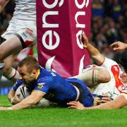 Rob Burrow scoring in the 2011 Grand Final when he won the Harry Sunderland