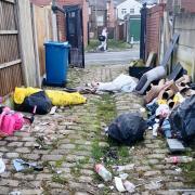 Rubbish being left in alleyways in Defiance Street, Atherton