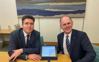 James Grundy, with rail minister Huw Merriman