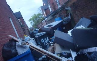 Rubbish left down the alleyways behind Raillway Road